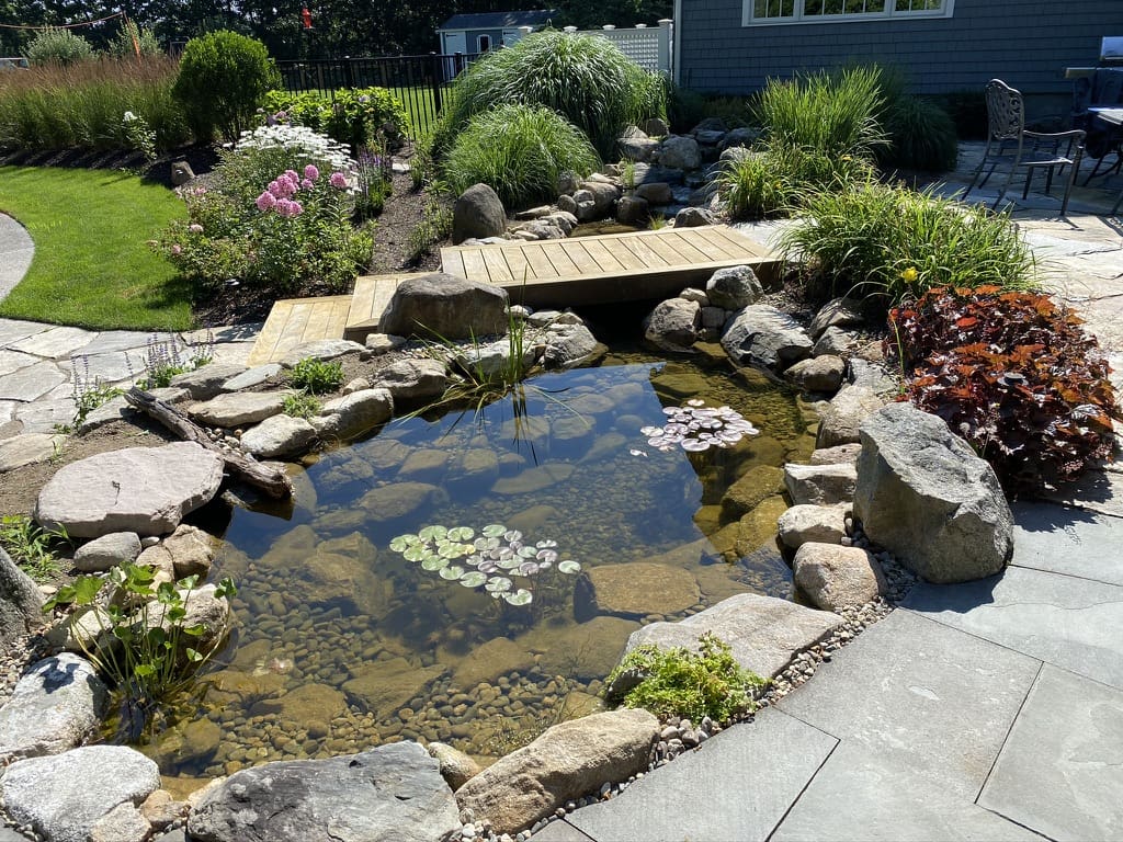 Why a Properly Built Pond Doesn’t Need a Hose Running Into It