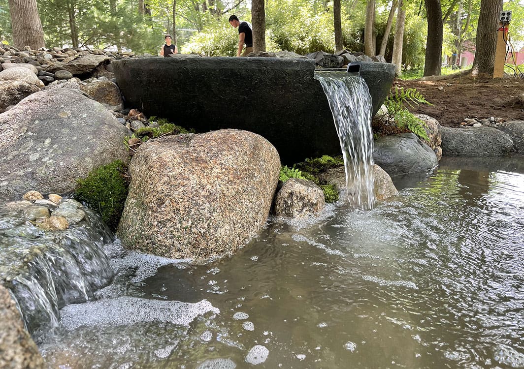 Sphere fountain with a polished granite finish