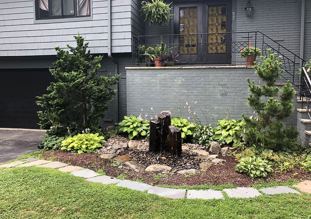 Patio fountainscape with a compact bubbling urn