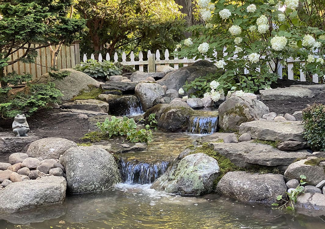 Newly filled pond running for the first time after construction