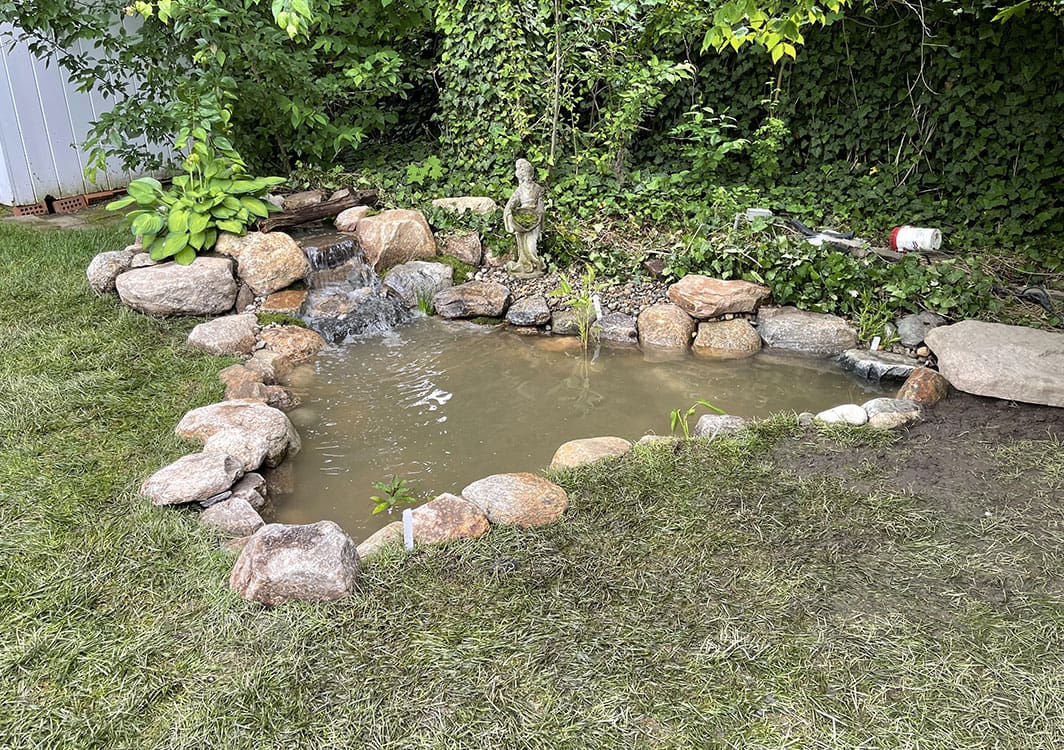 Skimmer replacement on an aging pond system
