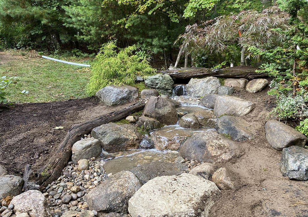 Pondless waterfall in a shaded woodland setting