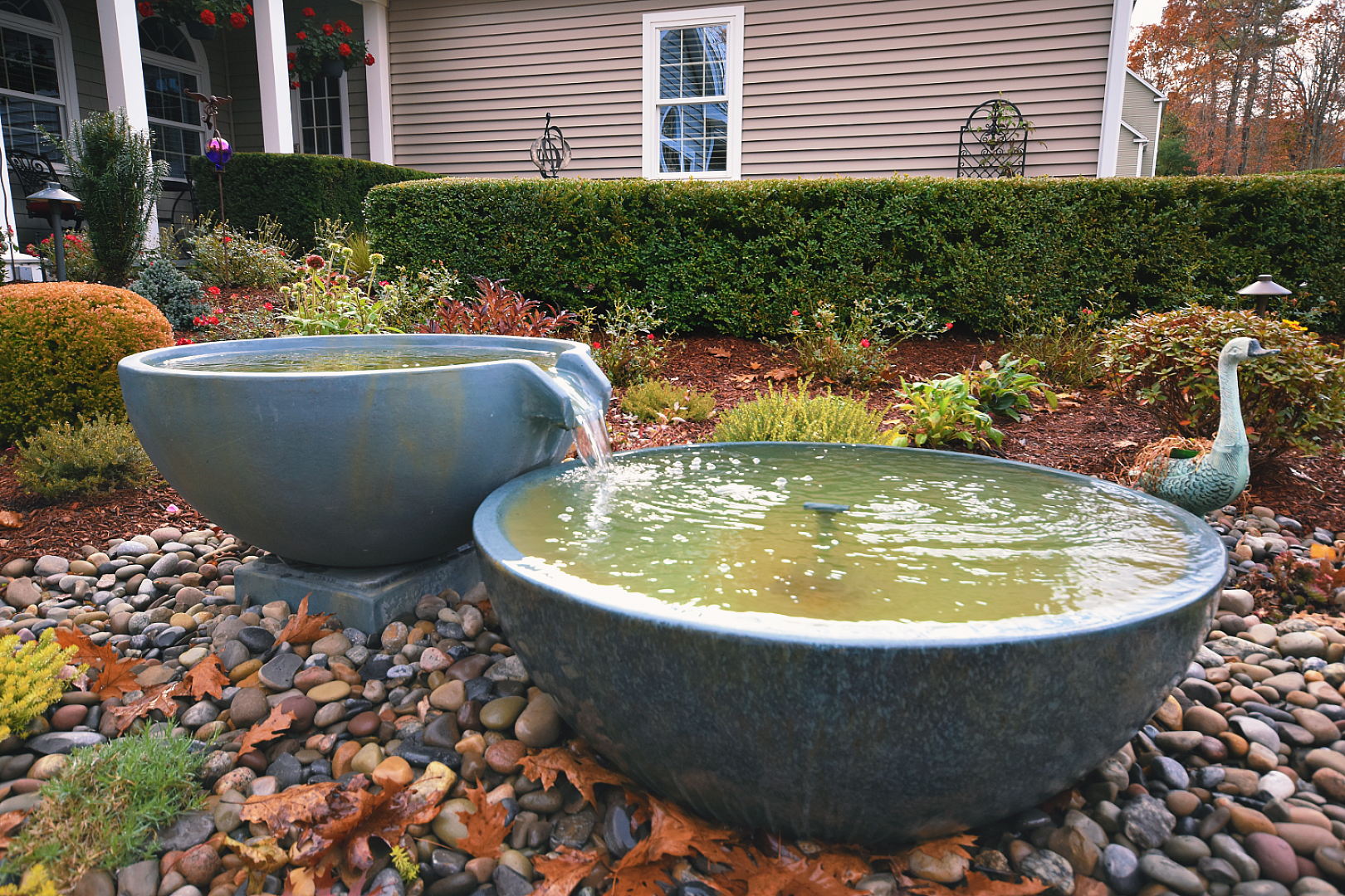 Garden fountains with flowing water feature